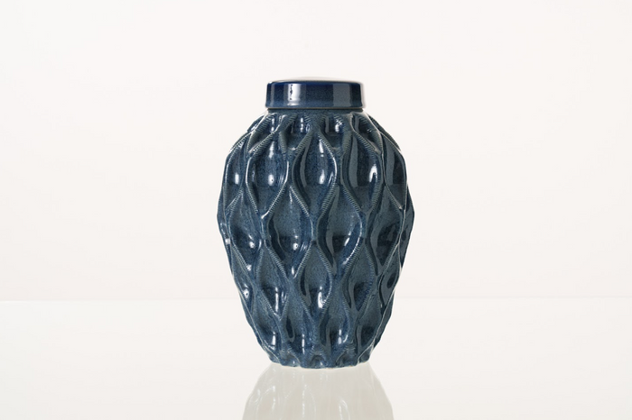 Navy blue Echo 3D printed ceramic urn with a sculpted teardrop lattice surface and a matching lid.